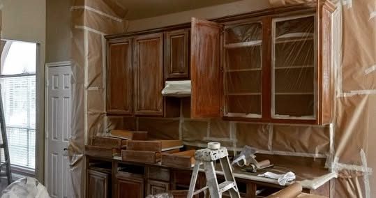 Before: dark wood kitchen cabinets